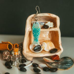 Elegant handmade earring with seashells and stones for a coastal vibe.