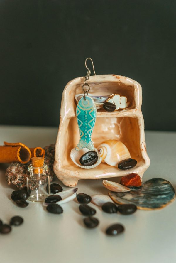 Elegant handmade earring with seashells and stones for a coastal vibe.